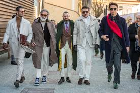 Pitti Uomo 109 — longer overcoats, subdued palette